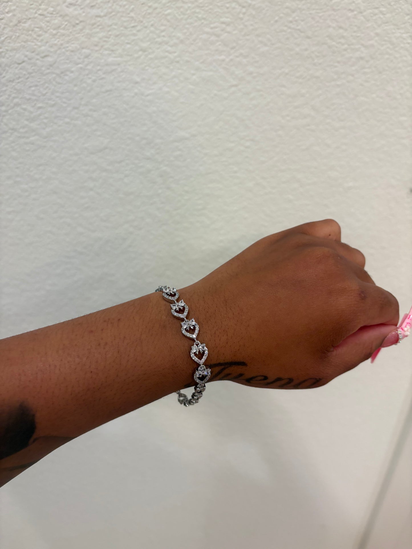 SLVER HRT BOW BRACELET