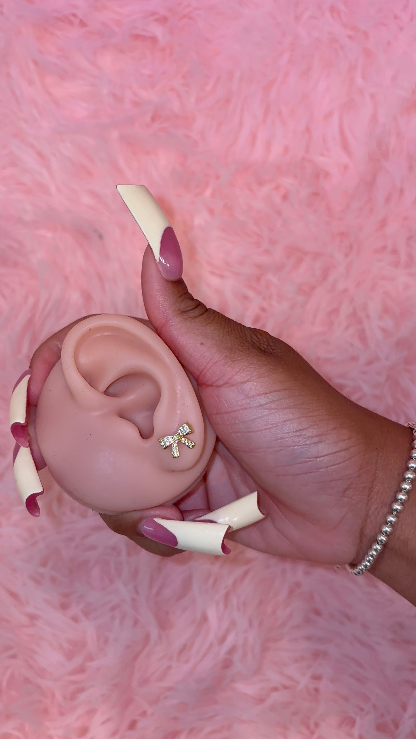 Dmnd bow earrings