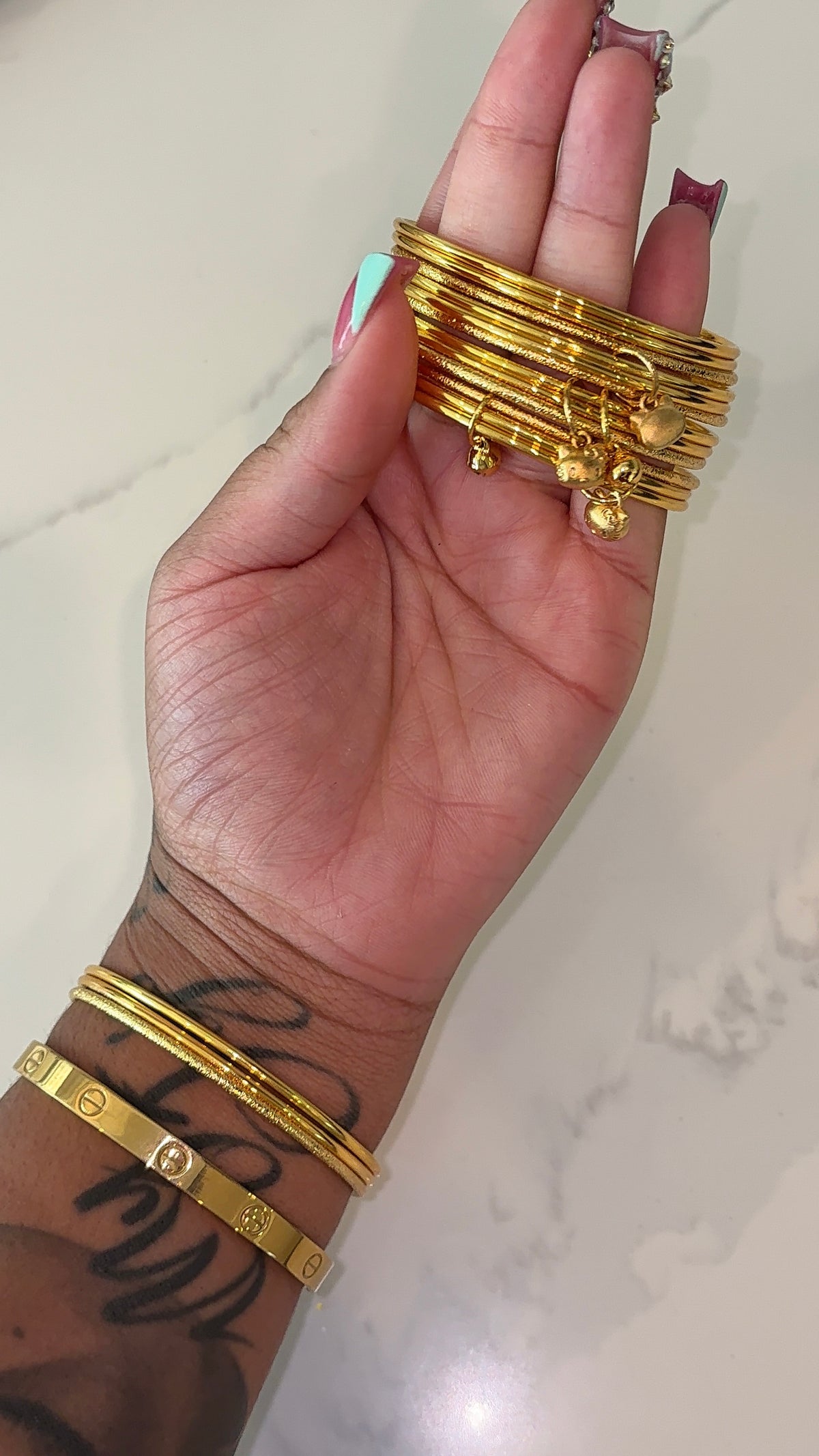 3 thin bangles + HK charm