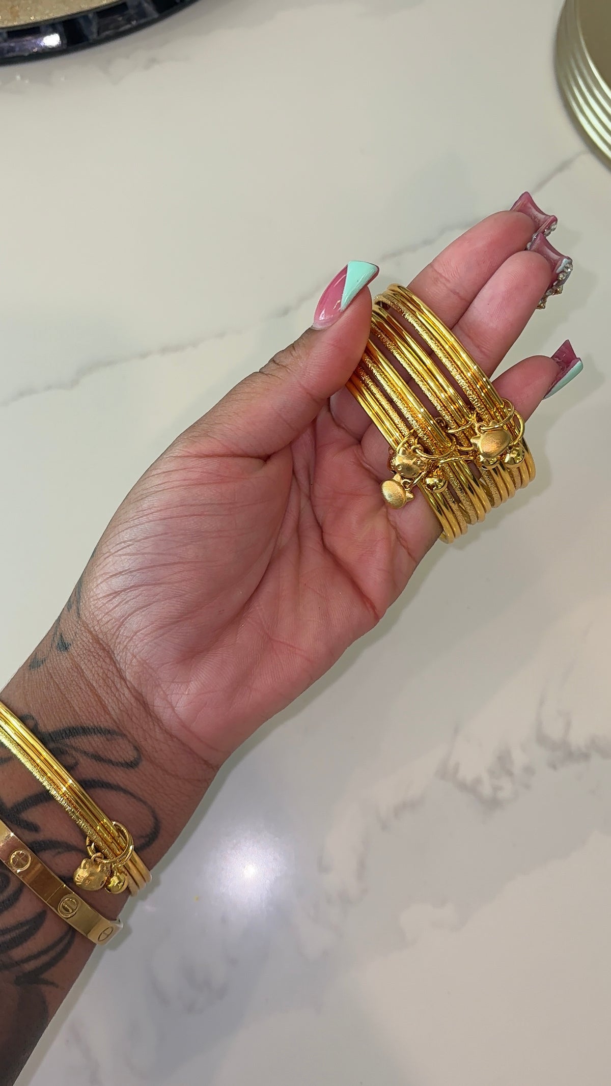3 thin bangles + HK charm